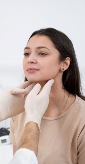 doctor-performing-routine-medical-checkup